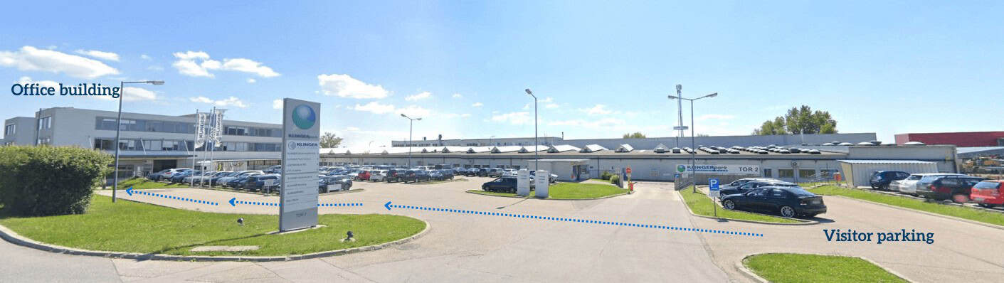 Visitor parking and office building